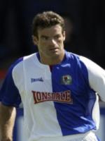 Hughes seeks defensive steel with Nelsen reunion Hughes seeks defensive steel with Nelsen reunion